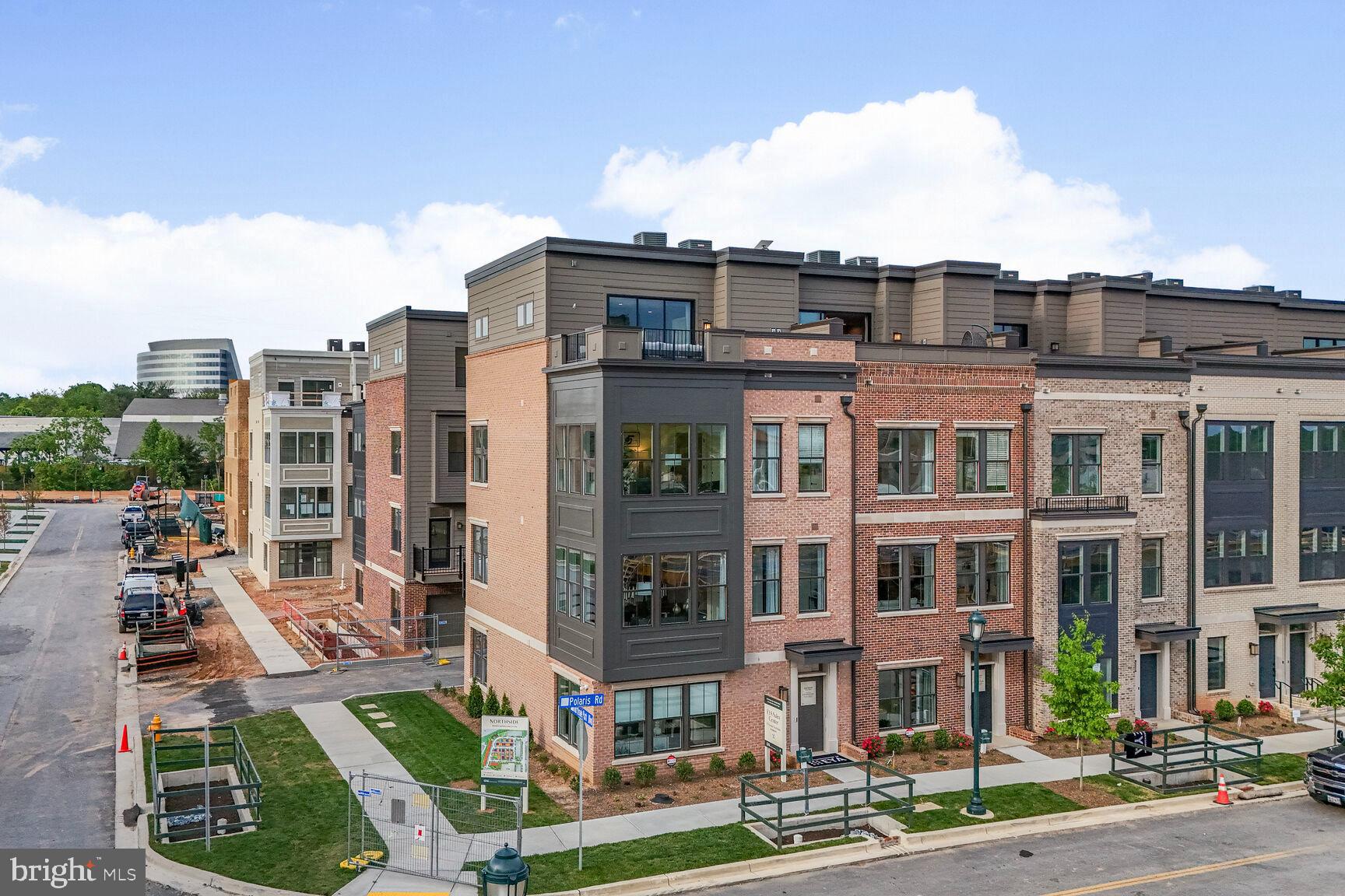 1135 Polaris Road, Unit CAMBRIDGE 78 Potomac, MD 20854 - Photo 11 of 11 a front view of a building with street view