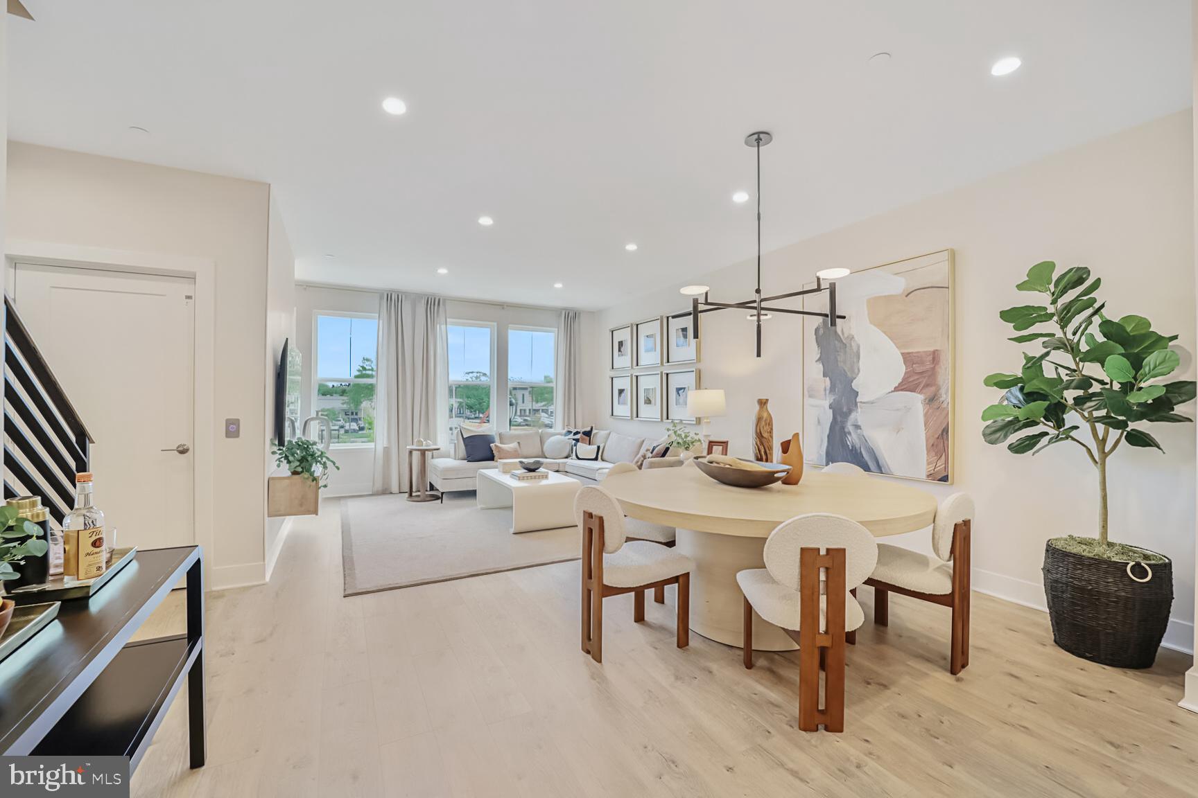 1135 Polaris Road, Unit CAMBRIDGE 78 Potomac, MD 20854 - Photo 8 of 11 a view of a dining room with furniture