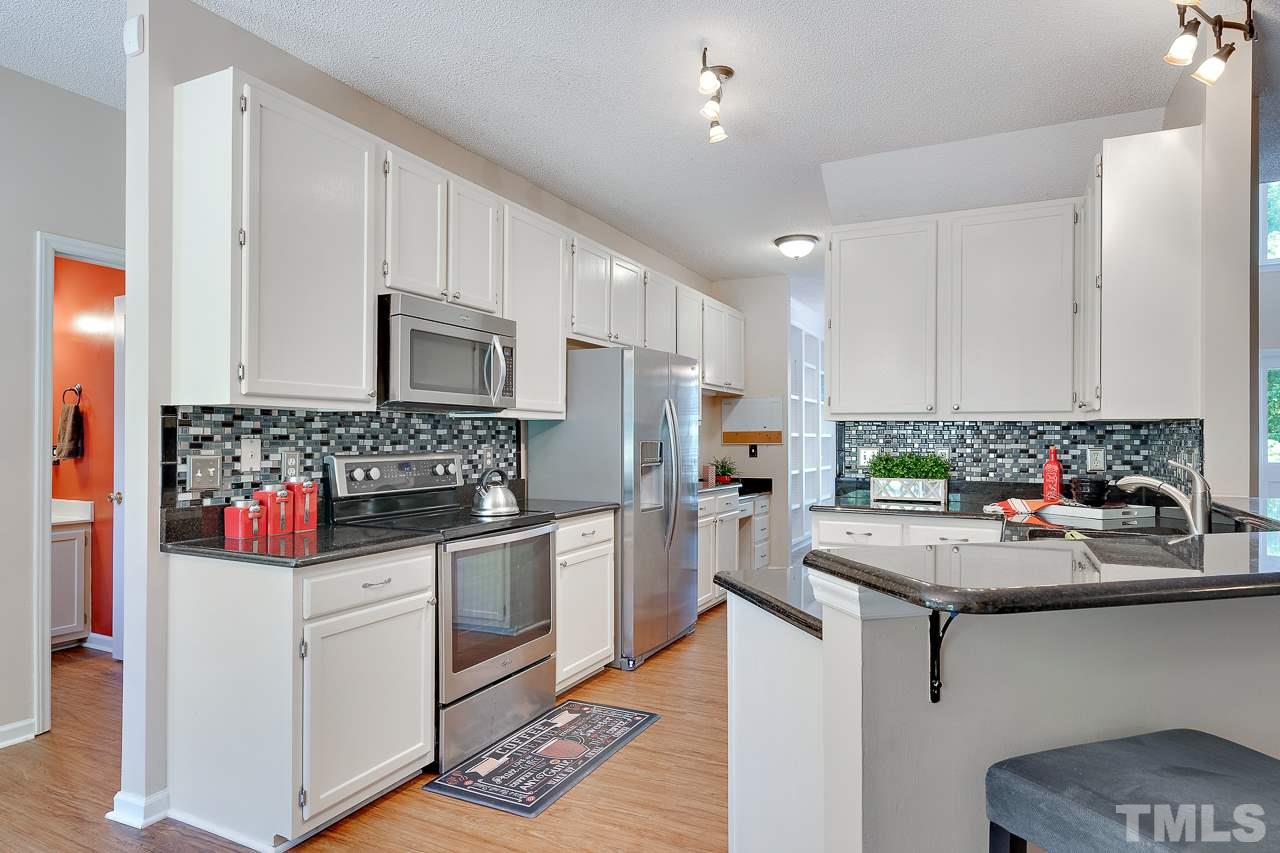 5216 Calverton Drive Raleigh, NC 27613 - Photo 2 of 30