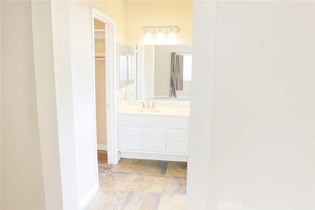 a bathroom with a shower and a toilet