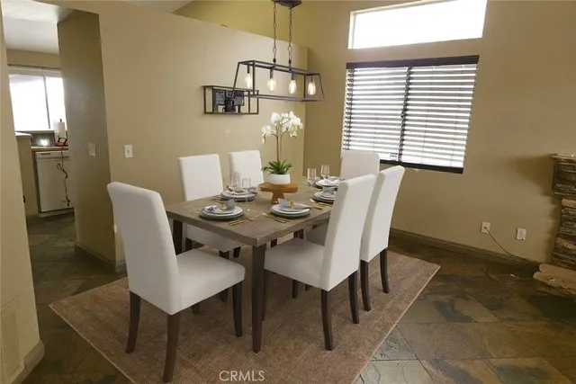 a view of a dining room with furniture