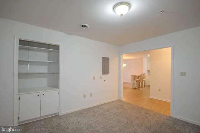 an empty room with windows