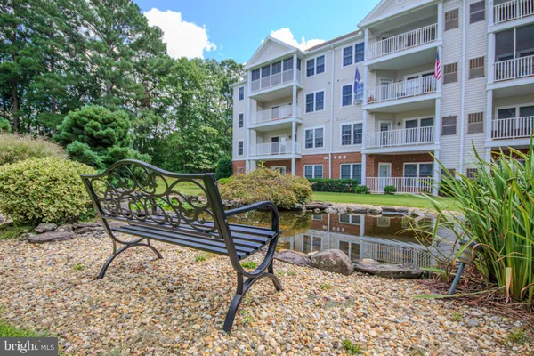 a front view of a building with street view