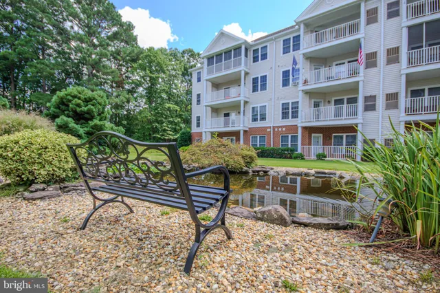 a front view of a building with street view