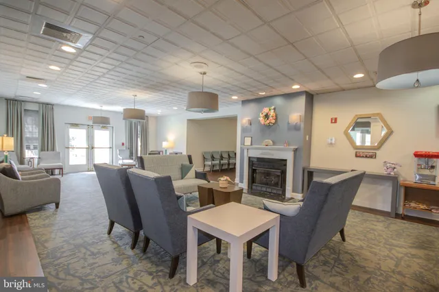 a living room with furniture and window