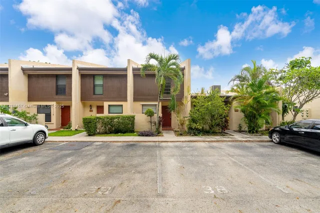 a view of street with parked cars