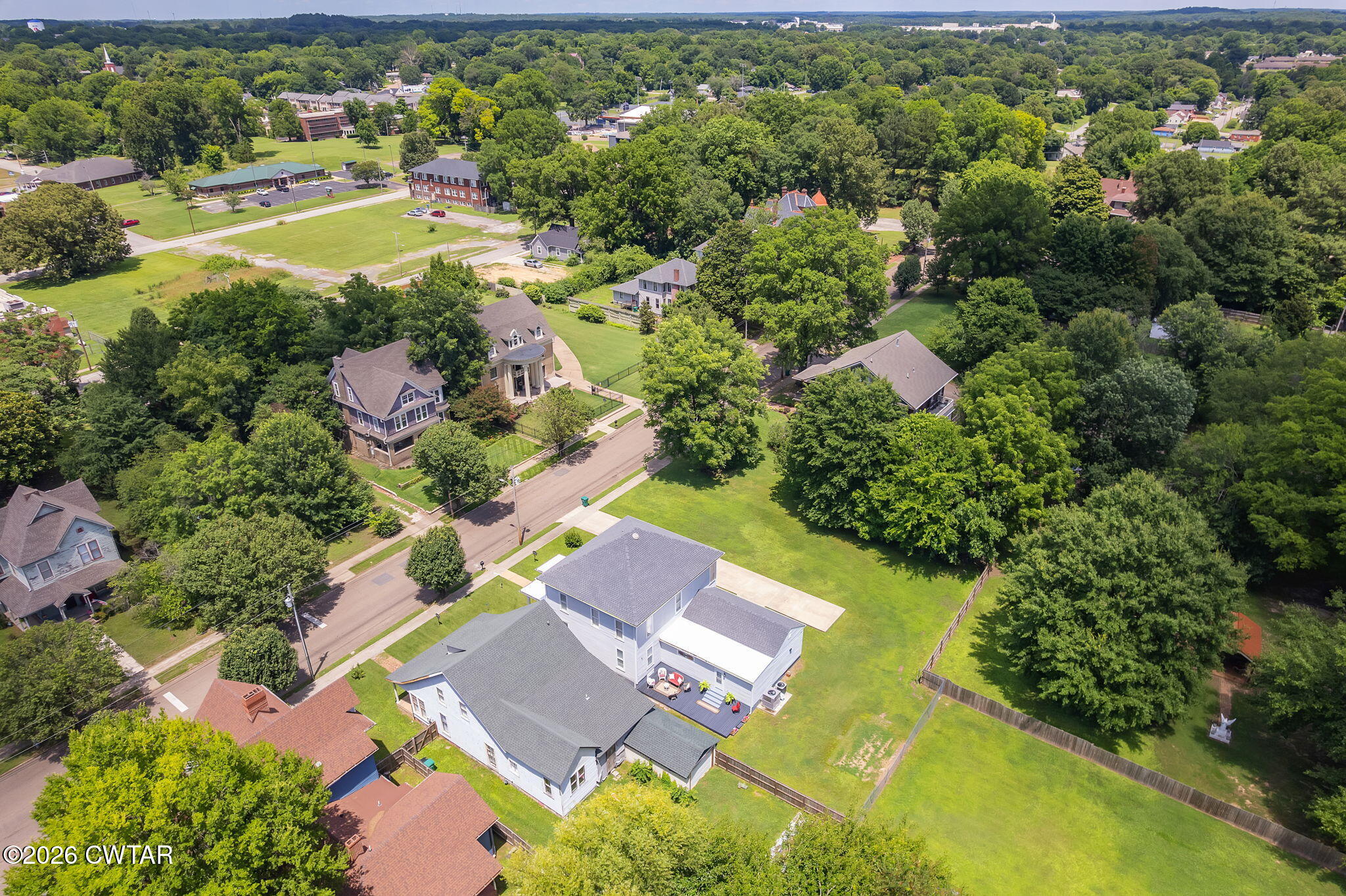554 East Main Street Jackson, TN 38301 - Photo 53 of 60 an aerial view of residential houses with outdoor space and swimming pool