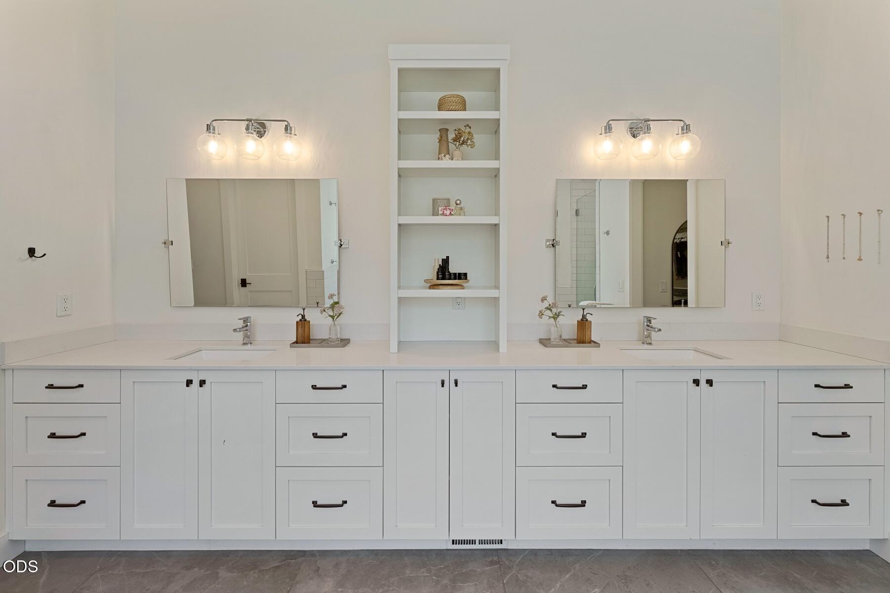 60255 Sunset View Drive Bend, OR 97702 - Photo 21 of 48 a bathroom with a double vanity sink mirror and