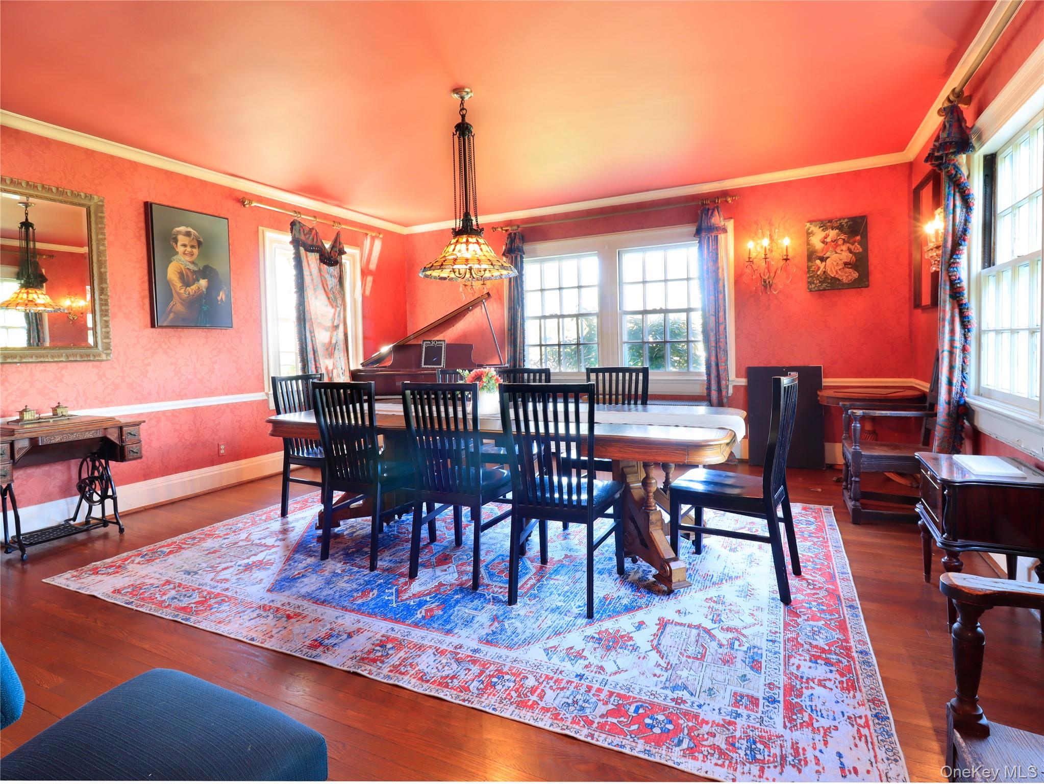 11-20 Shore Road Queens, NY 11363 - Photo 28 of 45 Dining area featuring hardwood flooring and white trim