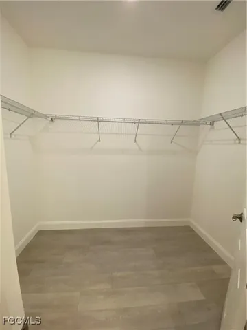 a view of a room with racks on the wall