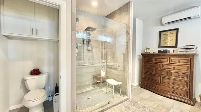 a view of a hallway with seating area