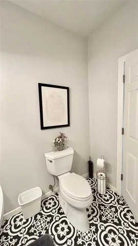 a bathroom with a sink and a stove