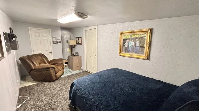 a living room with a couch and a flat screen tv