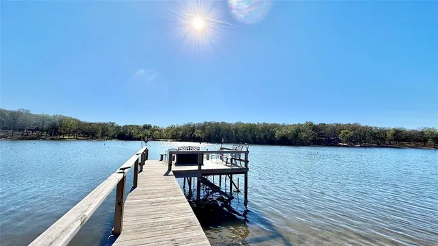 a view of a balcony with furniture