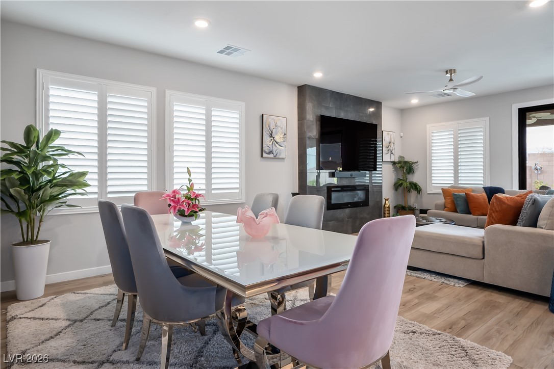 3018 Bounding Home Road North Las Vegas, NV 89086 - Photo 13 of 43 Dining room with light wood-style flooring, ceiling fan, and recessed lighting