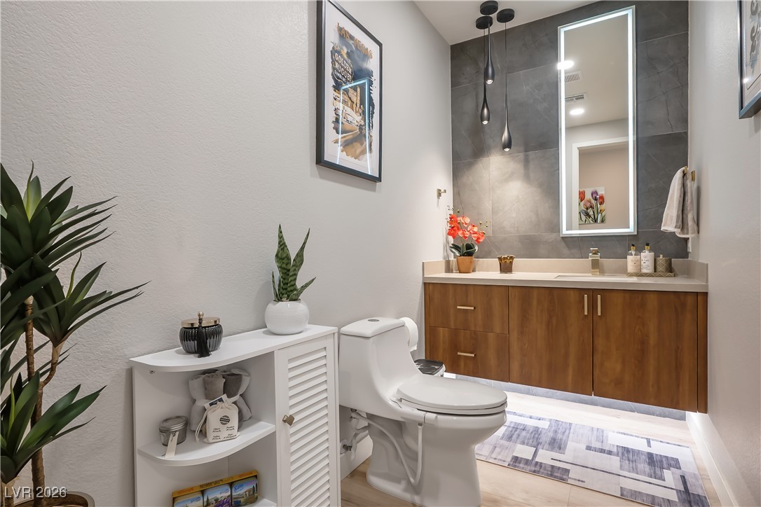 3018 Bounding Home Road North Las Vegas, NV 89086 - Photo 20 of 43 Bathroom featuring vanity and toilet