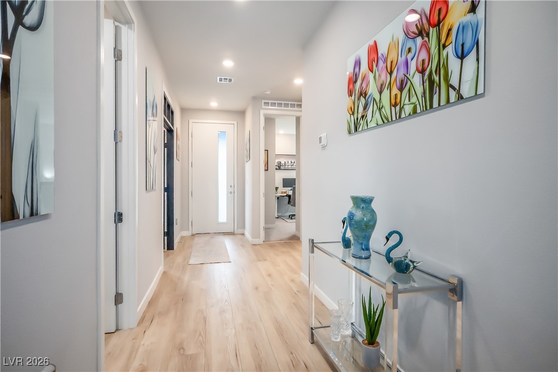 3018 Bounding Home Road North Las Vegas, NV 89086 - Photo 8 of 43 Foyer entrance featuring light wood-style flooring and recessed lighting