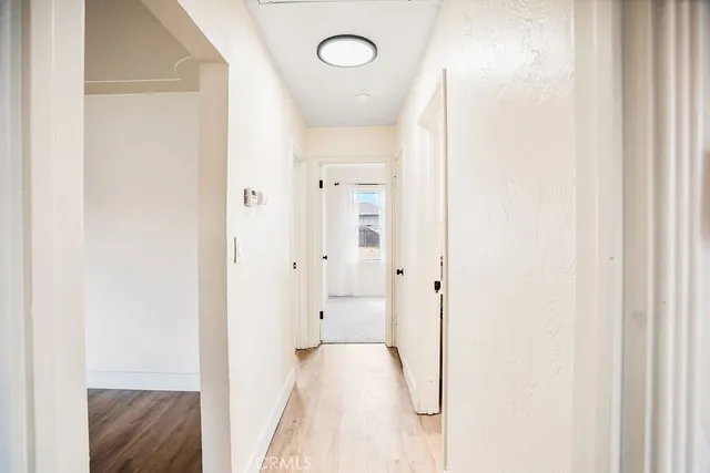 a view of a bathroom with a bathtub and shower