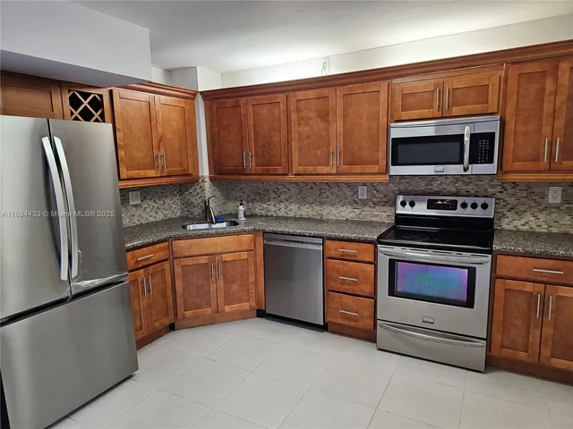 $530,000 | 10142 Southwest 77th Court, Unit 10142, Miami, FL 33156