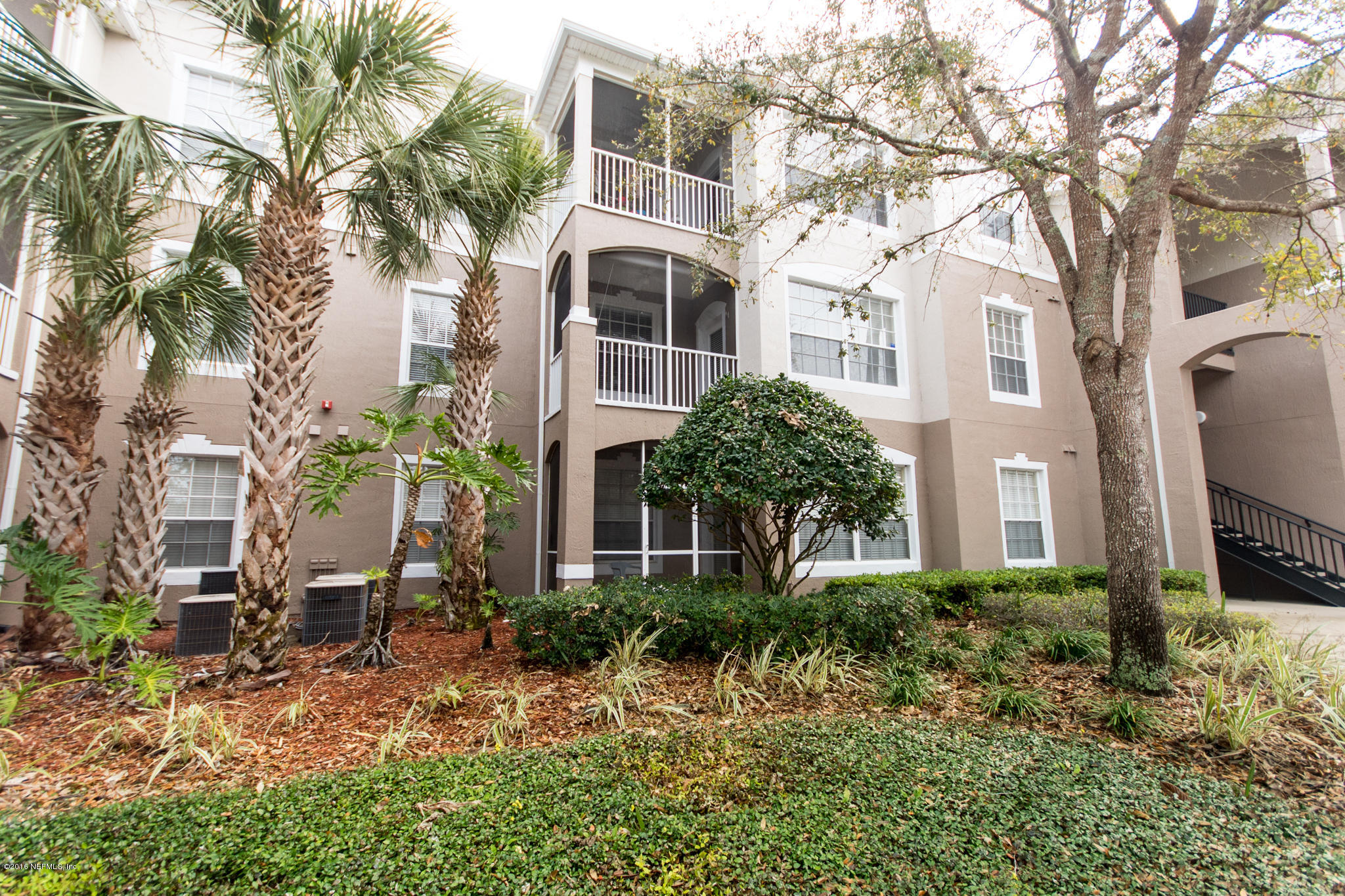 10550 Baymeadows Road, Unit 1010 Jacksonville, FL 32256 - Photo 1 of 32 a view of a yard in front of house