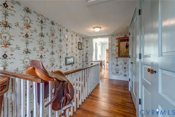 a bedroom with a bed and a fireplace