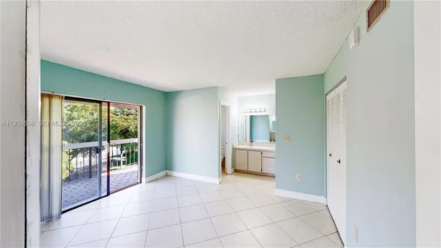 a view of a backyard with plants