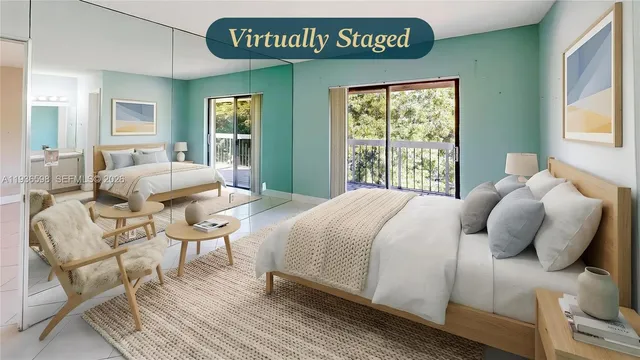 an aerial view of residential houses with city view