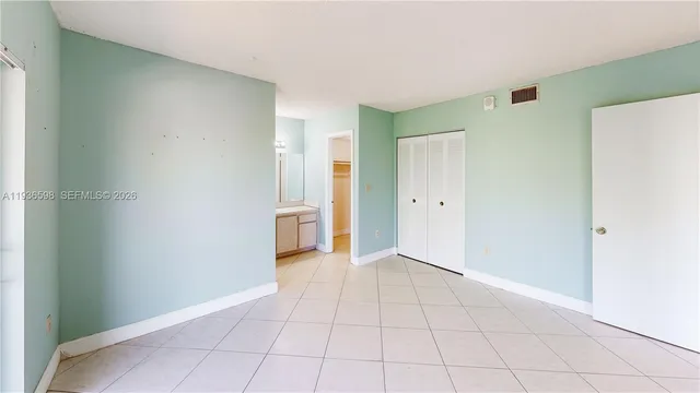 an aerial view of residential houses with city view