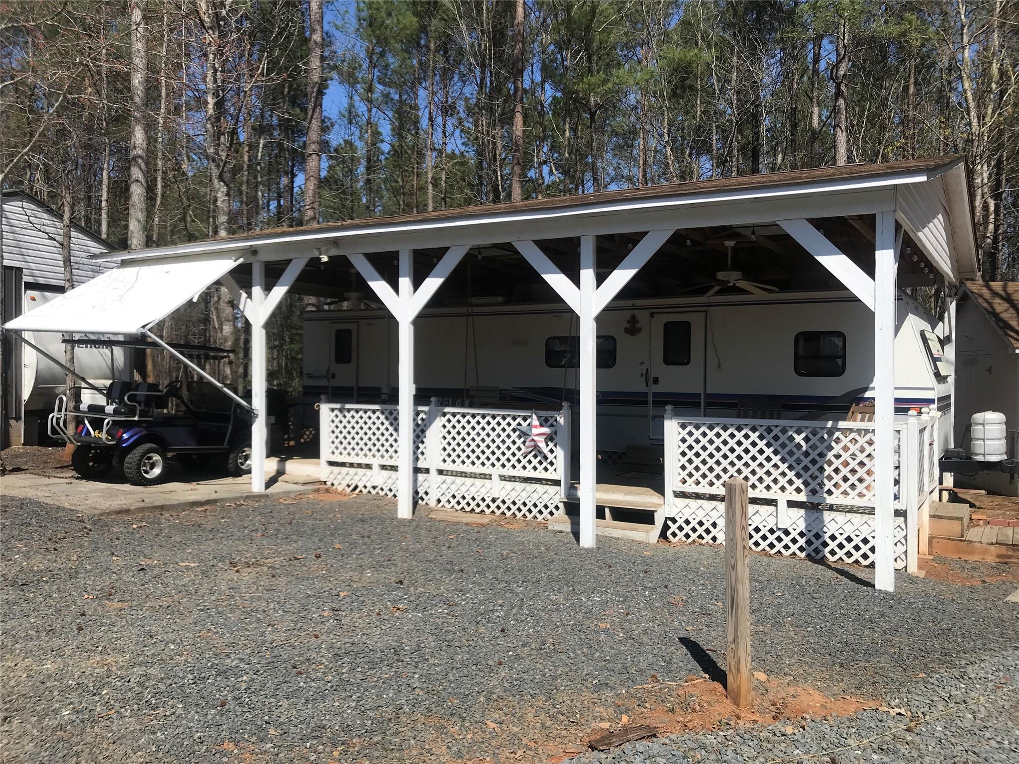 150 Roberts Ridge Road, Unit H48 Mount Gilead, NC 27306 - Photo 2 of 35 a front view of a house with parking space