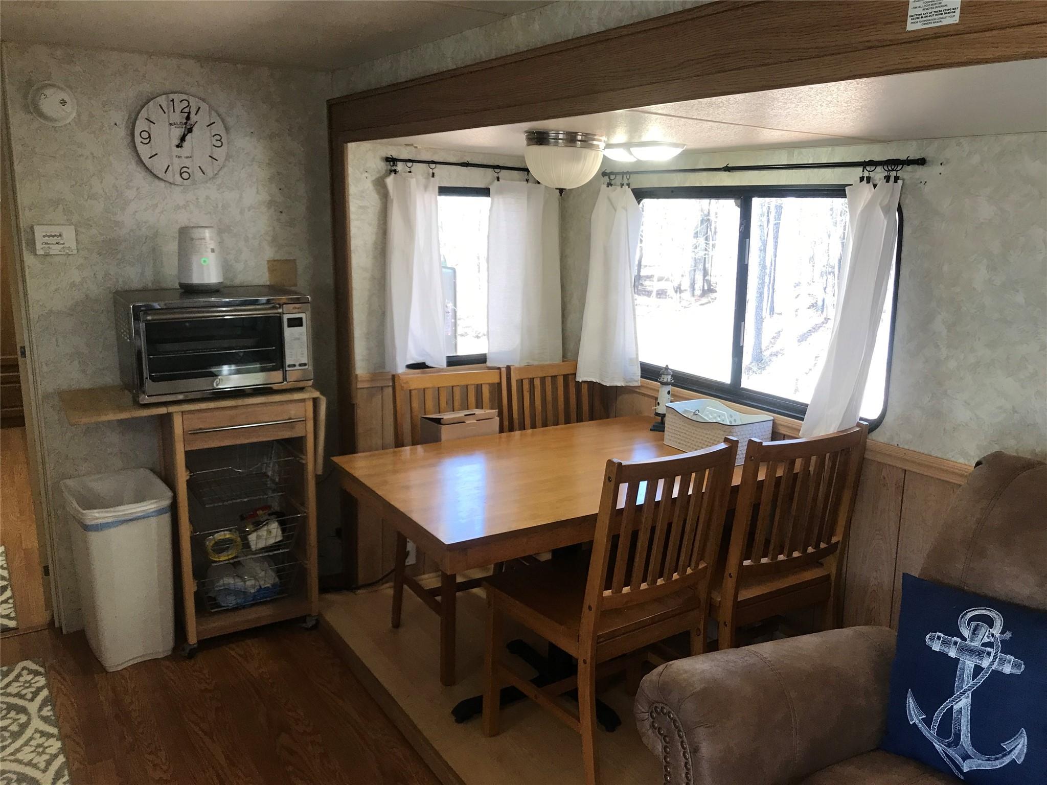 150 Roberts Ridge Road, Unit H48 Mount Gilead, NC 27306 - Photo 21 of 35 a dining room with furniture and window