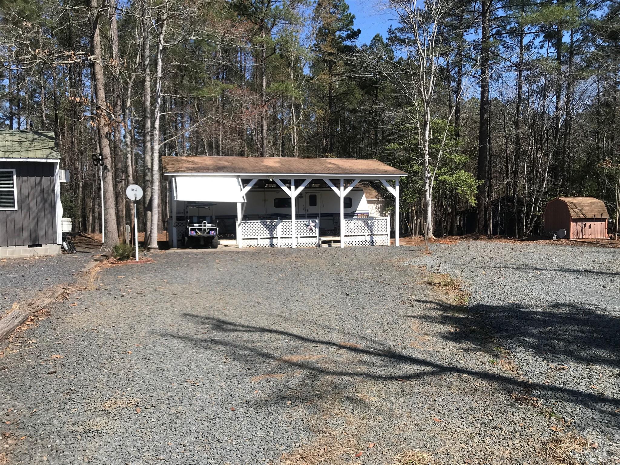 150 Roberts Ridge Road, Unit H48 Mount Gilead, NC 27306 - Photo 4 of 35 a view of a house with a yard