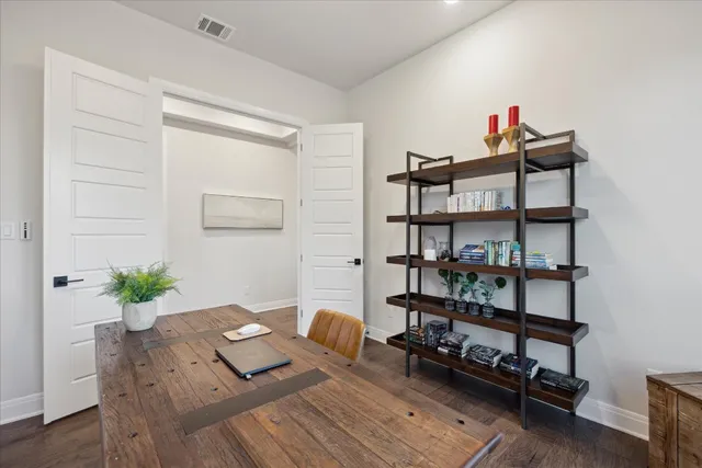 a view of a workspace with furniture