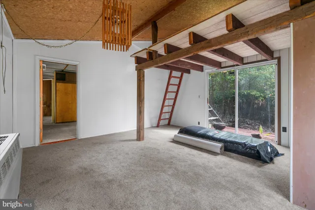 a view of swimming pool with seating space