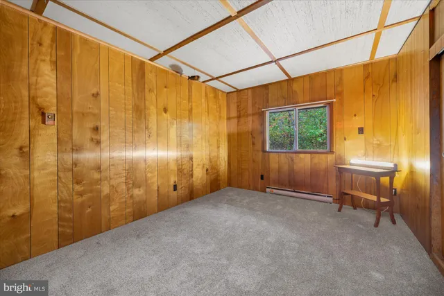 a view of empty room with windows