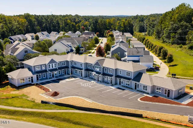 a view of a house with outdoor space and porch