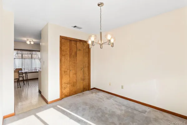 a view of a room with a chandelier