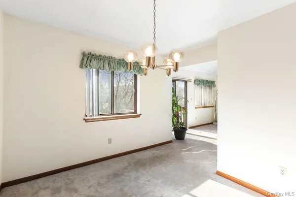 a view interior of a house and chandelier fan
