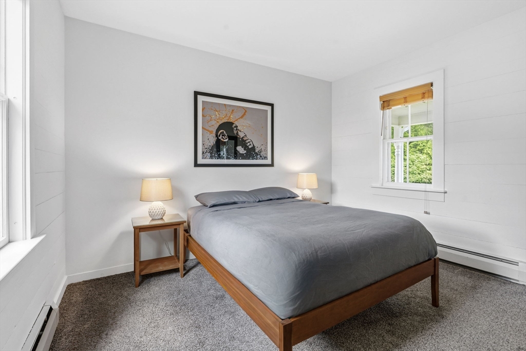58 Front Street Northampton, MA 01053 - Photo 40 of 42 a bedroom with a bed and a window