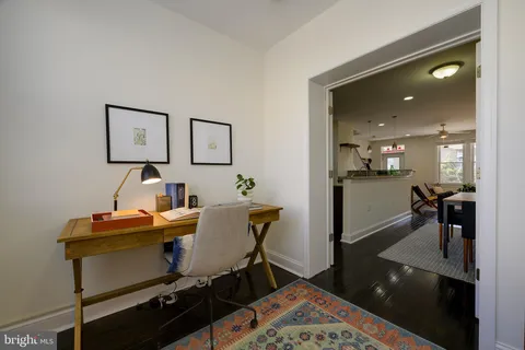 a view of a workspace with furniture