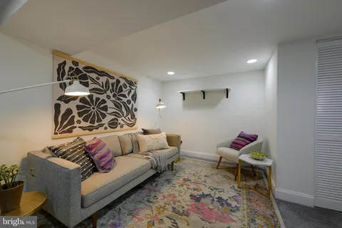 a living room with furniture and a couch