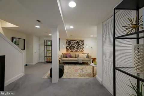 a view of living room and kitchen with furniture