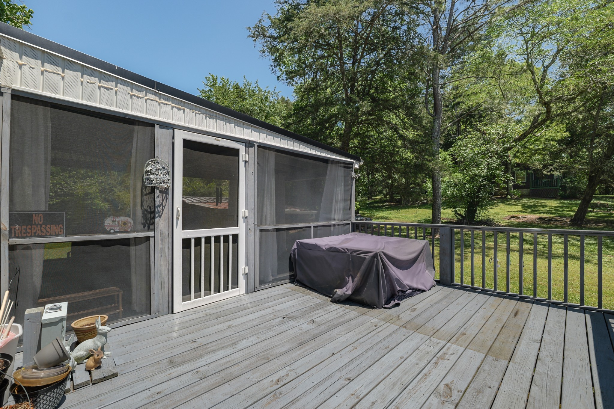 21 Lincoln Lake Road Kelso, TN 37348 - Photo 6 of 26 a view of balcony with furniture and wooden floor