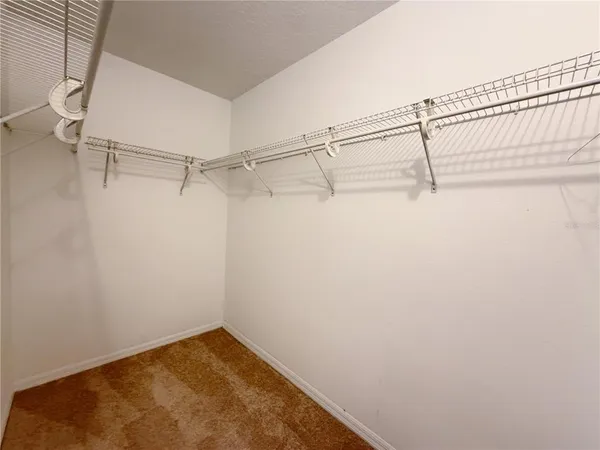 a view of a room with racks on the wall