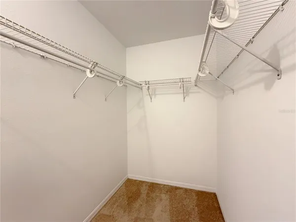 a view of a room with racks on the wall