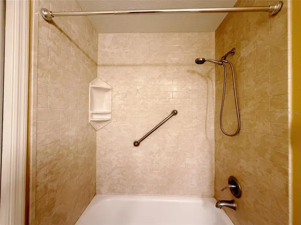 a bathroom with a bath tub