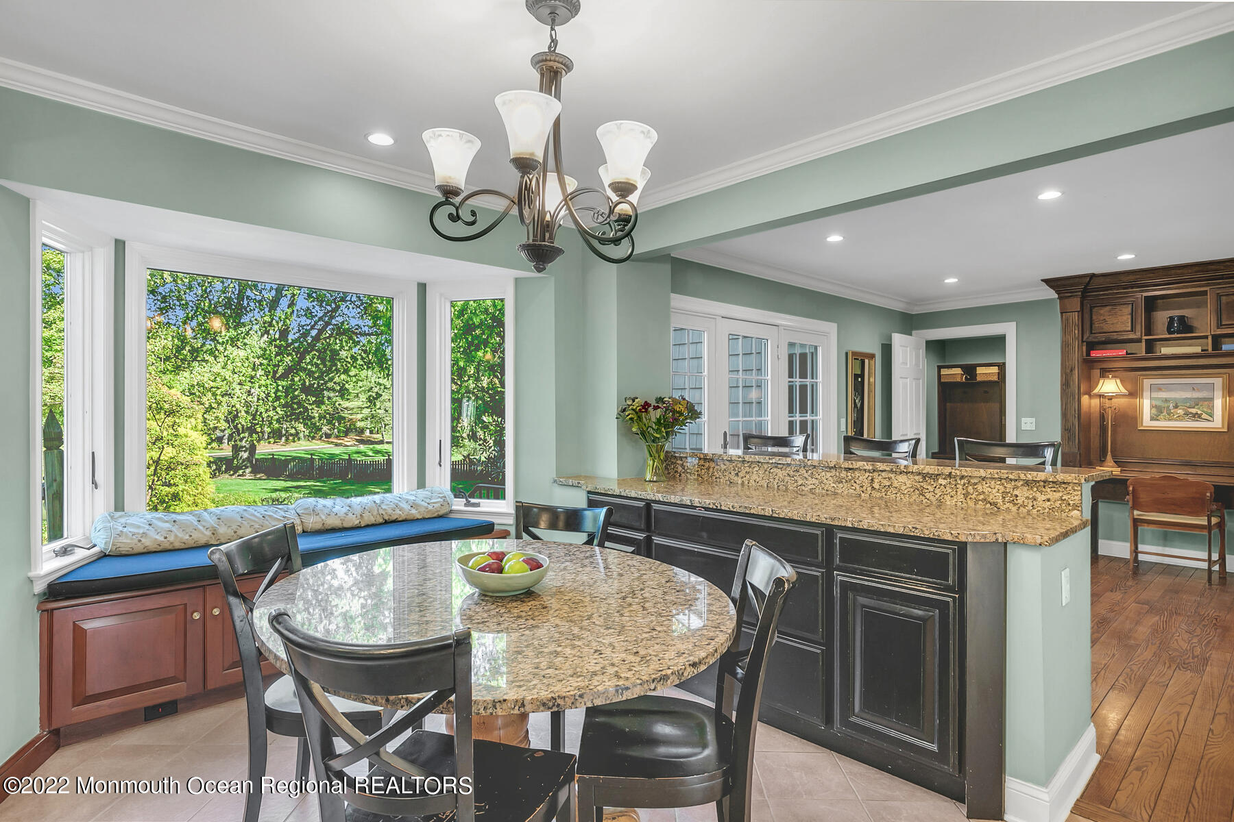 25 Spring Garden Avenue Colts Neck, NJ 07722 - Photo 13 of 58 a dining room filled chandelier and wooden furniture