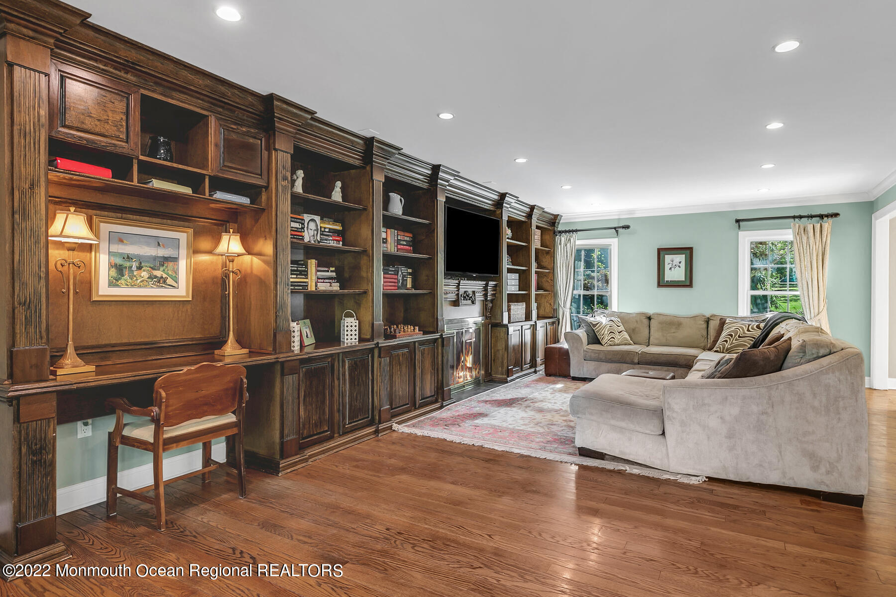25 Spring Garden Avenue Colts Neck, NJ 07722 - Photo 15 of 58 a living room with furniture a rug and a table