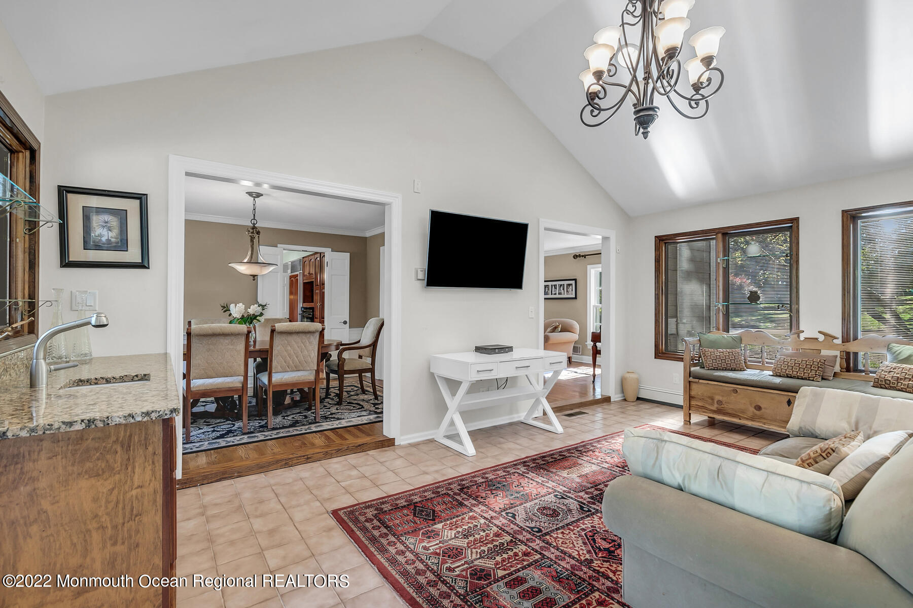 25 Spring Garden Avenue Colts Neck, NJ 07722 - Photo 18 of 58 a living room with furniture wooden floor and a flat screen tv