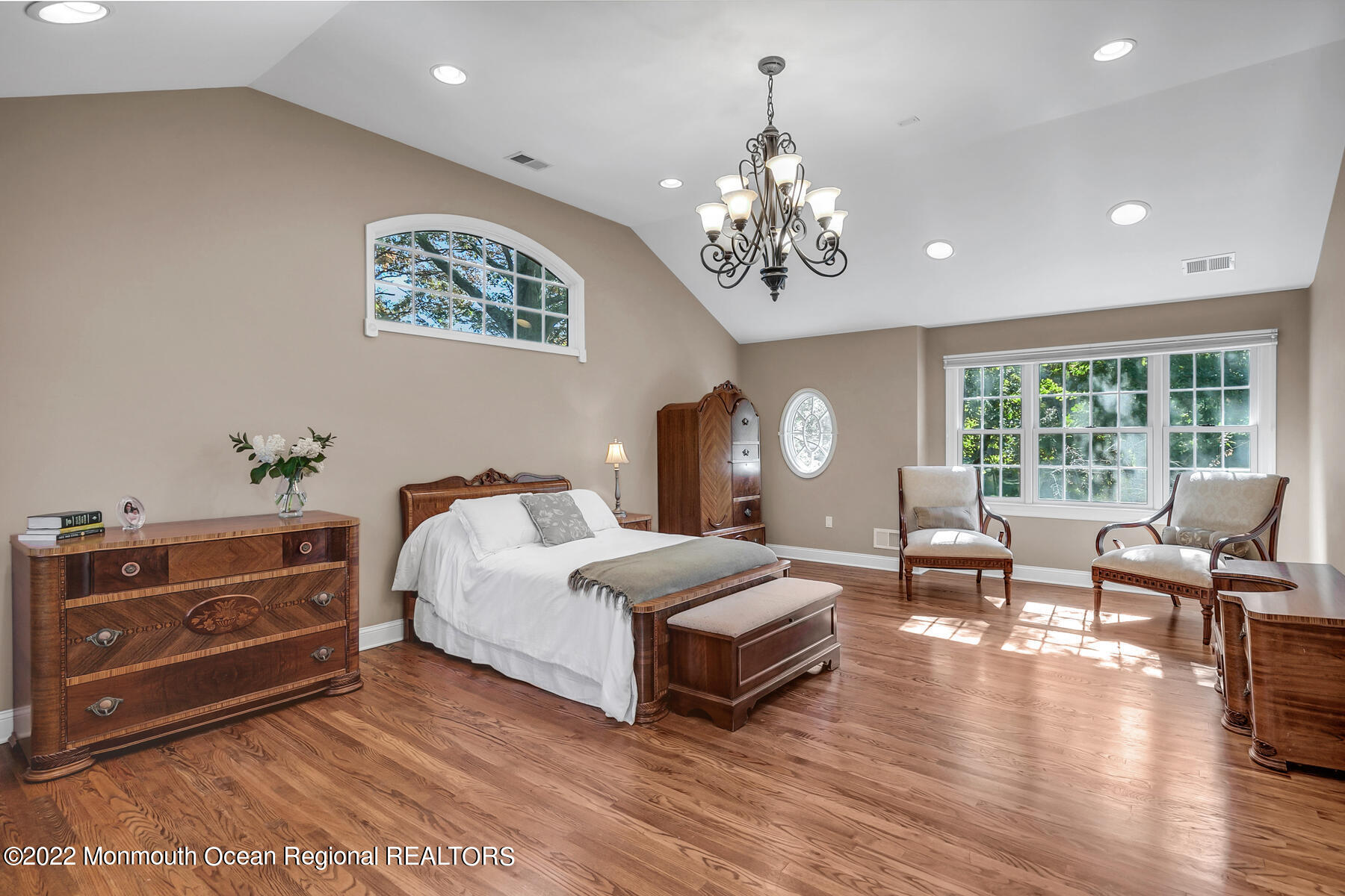 25 Spring Garden Avenue Colts Neck, NJ 07722 - Photo 31 of 58 a spacious bedroom with a bed and wooden floor