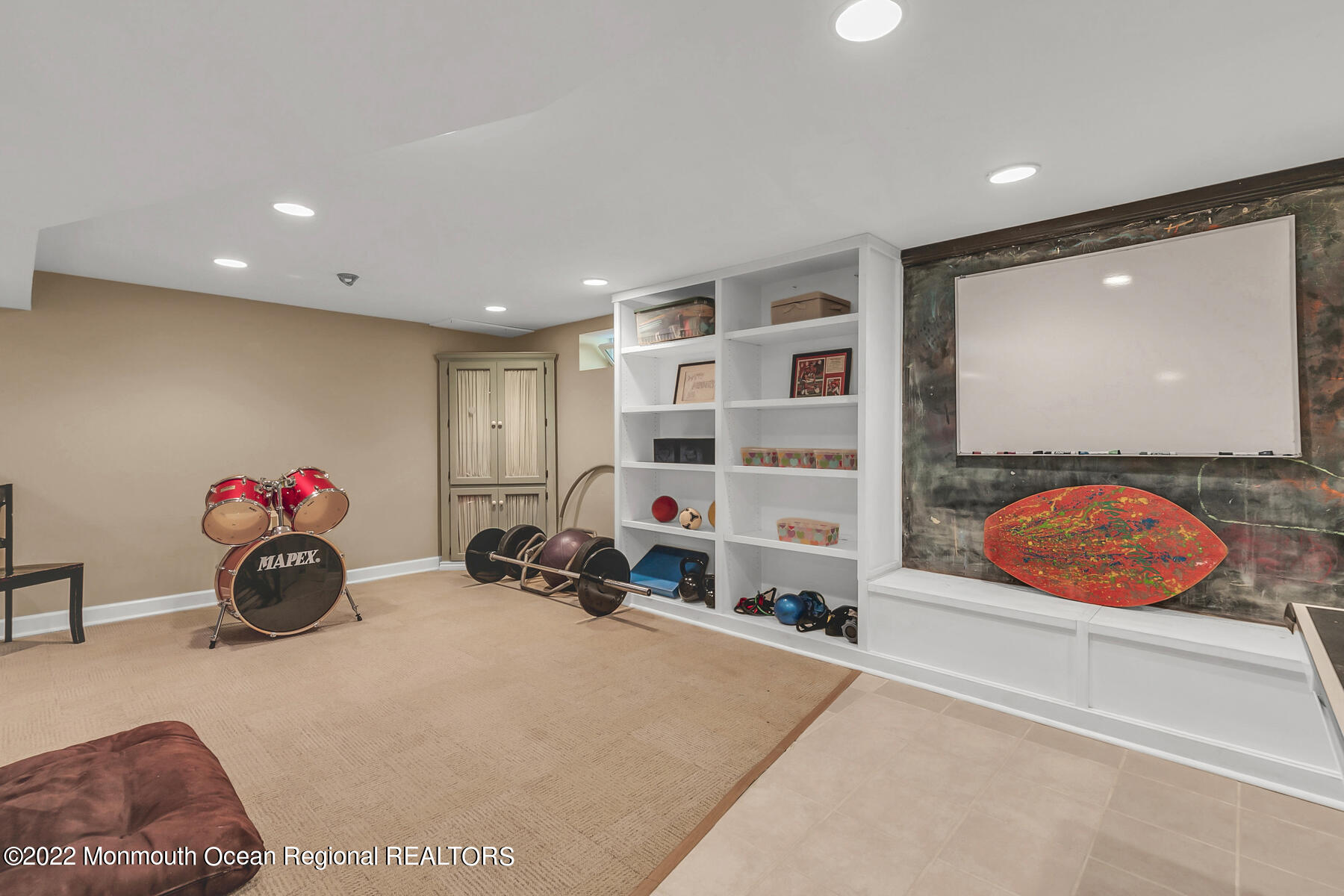 25 Spring Garden Avenue Colts Neck, NJ 07722 - Photo 36 of 58 a room with furniture and gym equipment